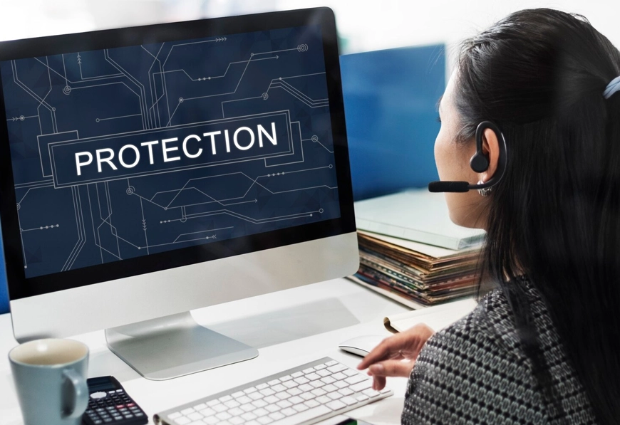 AIBN expert monitoring cybersecurity interface for legal data protection.