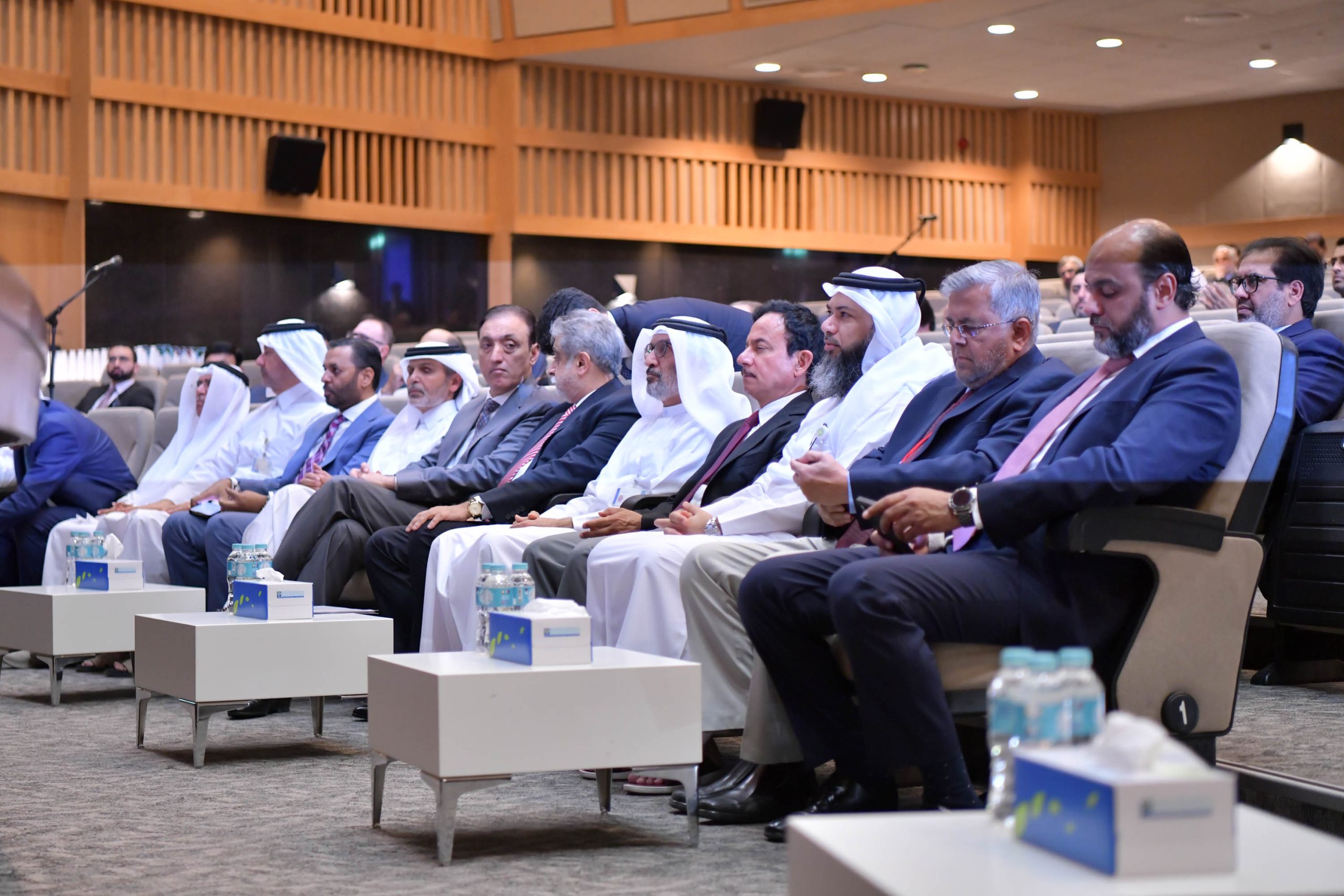 AIBN business conference with global professionals attending a keynote speech
