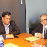 AIBN's team is collaborating, showing a business consultation.