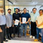 A group of business professionals from AIBN and partners at a strategic business meeting.